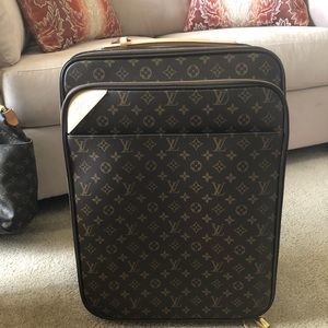 Louis Vuitton larger carry-on wheeled luggage